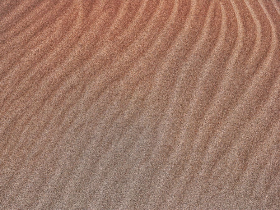 Representative sand texture; not a verified Summit product